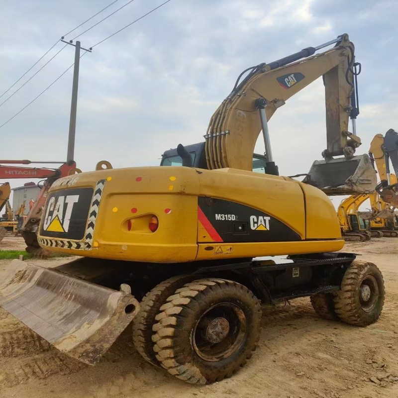 Подержанный экскаватор Original Cat M315D Б/у 15-тонный колесный экскаватор с ковшом 0,61 м3