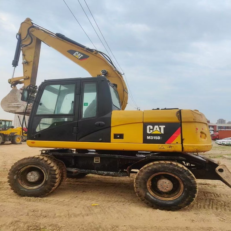 Подержанный экскаватор Original Cat M315D Б/у 15-тонный колесный экскаватор с ковшом 0,61 м3